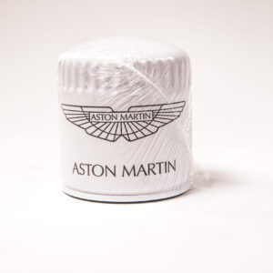 Velocity AP Keep your Aston Martin V12 engine running at its best with this OEM Oil Filter (AG43-6714-AA). Designed for optimal filtration and longevity, this genuine Aston Martin replacement part ensures proper oil flow and contaminant removal, protecting your high-performance engine.